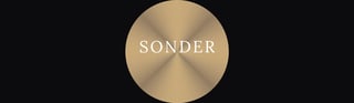 Sonder Digital wordmark logo with SONDER in serif font above DIGITAL with champagne gold period